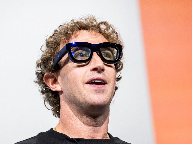 Mark Zuckerberg, chief executive officer of Meta Platforms Inc., wears Orion augmented reality (AR) glasses during the Meta Connect event in Menlo Park, California, US, on Wednesday, Sept. 25, 2024. Meta Platforms Inc. debuted its first pair of augmented reality glasses, devices that show a combined view of the digital and physical worlds, a key step in Chief Executive Officer Mark Zuckerberg's goal of one day offering a hands-free alternative to the smartphone. Photographer: David Paul Morris/Bloomberg