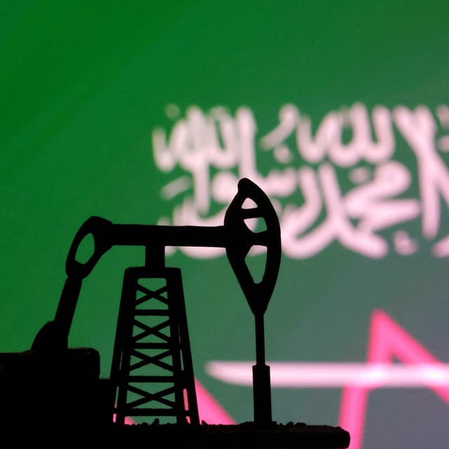 FILE PHOTO: Saudi Arabian flag with stock graph and an oil pump jack miniature model are seen in this illustration taken October 9, 2023. REUTERS/Dado Ruvic/Illustration/File Photo