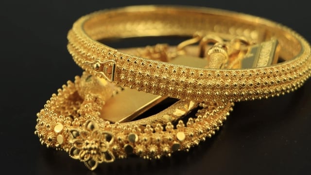 Gold and silver prices dipped on Friday, yet both are on track for weekly gains. Silver reached a 10-year high earlier, with analysts predicting continued strength for gold due to potential Fed rate cuts and global tensions.