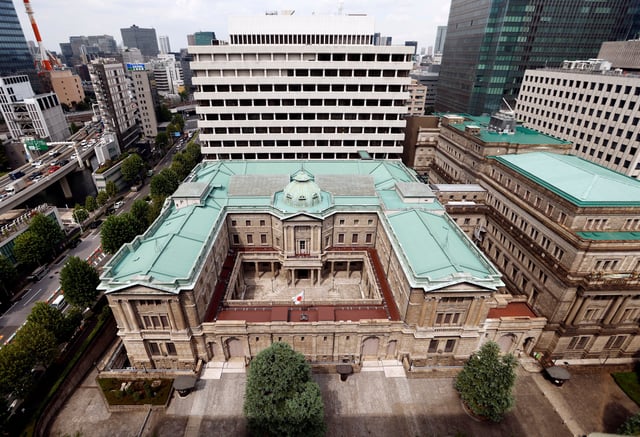 Japanese national flag is hoisted atop the headquarters of Bank of Japan in Tokyo, Japan September 20, 2023.  REUTERS/Issei Kato/File Photo