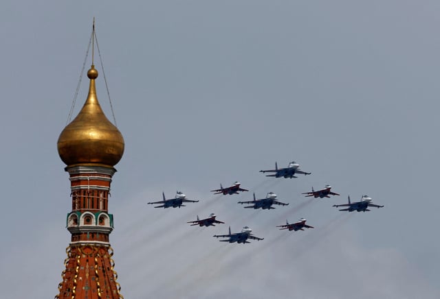Russian army MiG-29 jet fighters of the Strizhi (Swifts) and Su-30SM jet fighters of the Russkiye Vityazi (Russian Knights) aerobatic teams fly in formation during a flypast and a military parade on Victory Day, in Moscow, Russia, May 9, 2024. REUTERS/Shamil Zhumatov/File Photo