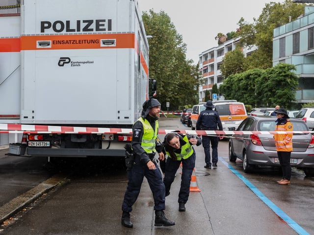 Police officers are seen next to a daycare centre outside where a man attacked several children injuring three, before being arrested, in Zurich, Switzerland, on October 1, 2024. A stabbing attack on children outside a Zurich daycare centre left one boy seriously wounded and two others injured, said police who detained a Chinese national. The three children hurt in the attack were treated by paramedics and taken to hospital. (Photo by ARND WIEGMANN / AFP) (Photo by ARND WIEGMANN/AFP via Getty Images)