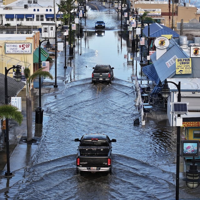 Flood waters inundate the main street after Hurricane Helene passed offshore on September 27, 2024 in Tarpon Springs, Florida. While the immediate aftermaths of hurricanes are devastating, new research suggests deadly effects can persist for 15 years.