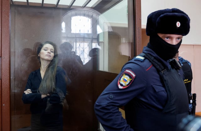 Journalist Antonina Favorskaya stands inside an enclosure for defendants in a courtroom in Moscow, Russia, March 29, 2024. REUTERS/Yulia Morozova/File Photo