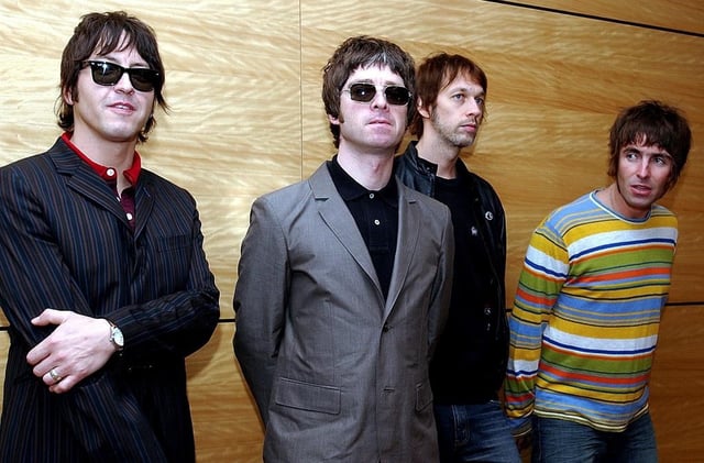 Members of British rock band Oasis pose for photos ahead of a concert in Hong Kong, Feb. 25, 2006. From left are, Gem Archer, Noel Gallagher, Andy Bell, and Liam Gallagher. 