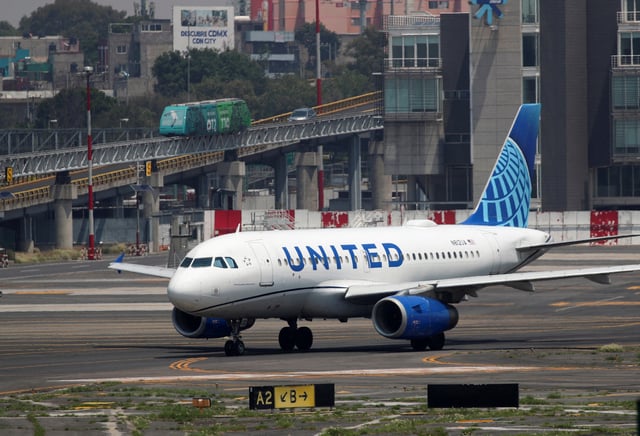 A United Airlines jet is pictured at Benito Juarez International airport in Mexico City, Mexico September 14, 2023. REUTERS/Henry Romero/File Photo