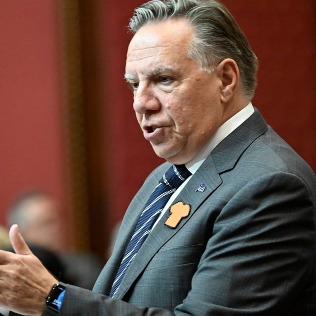 Quebec Premier Francois Legault responds to the Opposition during question period, Thursday, September 26, 2024 at the legislature in Quebec City. Legault says the federal government should require asylum seekers to move to other provinces, including those already living in Quebec. THE CANADIAN PRESS/Jacques Boissinot