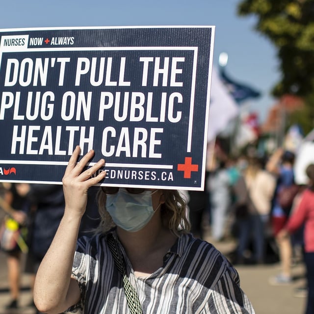 Alberta's nurses could soon find themselves on the picket line as nearly two weeks of informal mediation with the provincial government wasn't enough to secure a new agreement. Nurses and supporters rally in front of the Royal Alexandra Hospital in Edmonton on Wednesday, Aug. 11, 2021. THE CANADIAN PRESS/Jason Franson