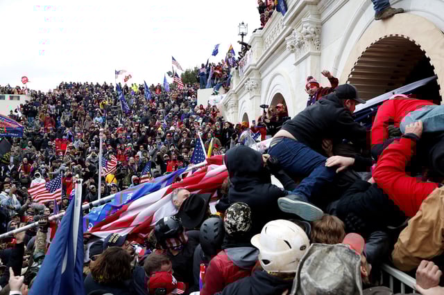 Pro-Trump protesters storm into the U.S. Capitol during clashes with police, during a rally to contest the certification of the 2020 U.S. presidential election results by the U.S. Congress, in Washington, U.S, January 6, 2021. REUTERS/Shannon Stapleton/File Photo