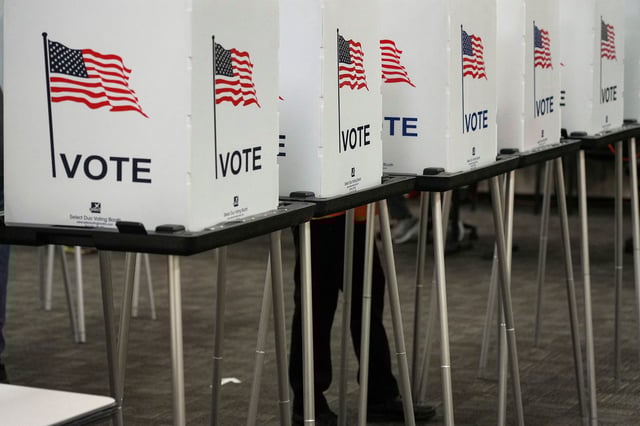 Voting booths are pictured inside the Dona Ana County Government Center during early voting for the upcoming midterm elections in Las Cruces, New Mexico, on October 24, 2022.