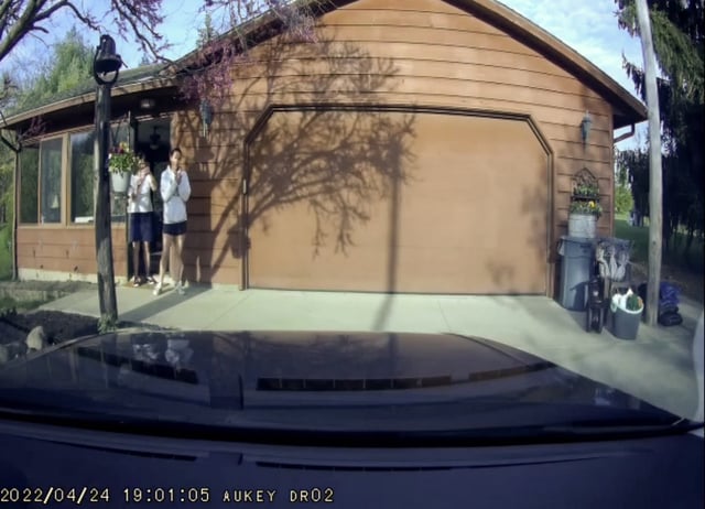Still footage from a video of Timothy Hovanec arriving at his wife's home, Amanda Hovanec, in Wapakoneta, Ohio, on April 24, 2022, to drop off the couple's three children. Federal authorities allege that shortly after Amanda Hovanec injected her husband with an animal tranquilizer, killing him.