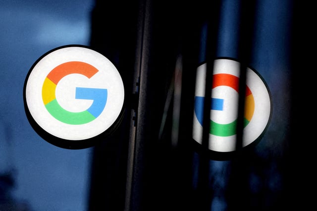 FILE PHOTO: The logo for Google is seen at a Google store in Manhattan, New York City, U.S., November 17, 2021. REUTERS/Andrew Kelly/File Photo