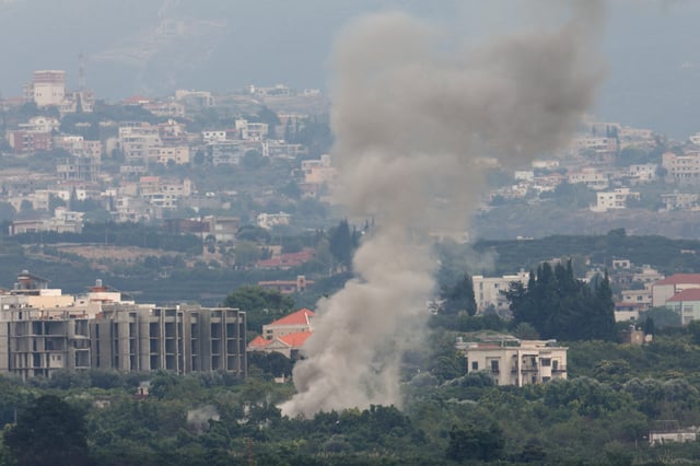 Smoke billows amid the ongoing hostilities between Hezbollah and Israeli forces, as seen from Tyre, southern Lebanon October 6, 2024. REUTERS/Aziz Taher