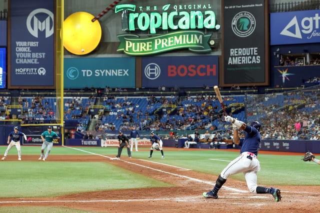 Yandy Diaz #2 of the Tampa Bay Rays connects on a walk-off home run against the Seattle Mariners during the ninth inning of a baseball game at Tropicana Field on September 9, 2023 in St. Petersburg, Florida.