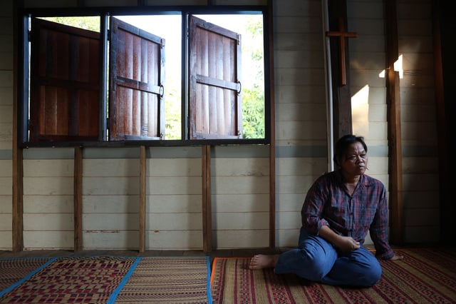 Wiwwaro Sriaoun, 53, mother of a remaining Thai hostage captured by Hamas Watchara Sriaoun, sits inside her house, in Kut Yang village, Udon Thani province, Thailand, October 6, 2024. REUTERS/Thomas Suen