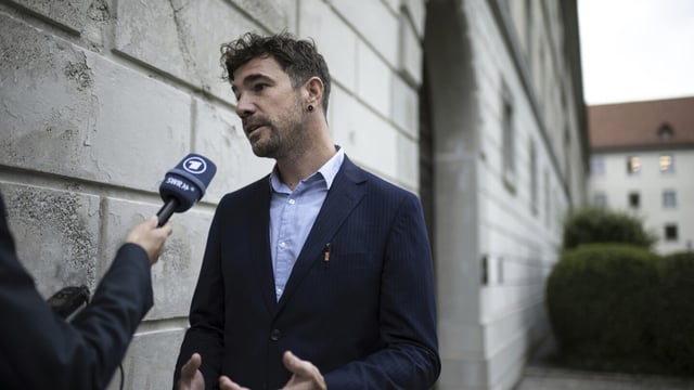 CAPTION CORRECTS NAME SPELLING - Benoit Meystre of NGO Trial International talks to press outside of the court of St. Gallen, Switzerland, Tuesday, Sept. 19, 2023. Harauski was supposedly a member of a special force acting on behalf of president Alexander Lukaschenko. He is on trial for the forced disappearance of three Belarusian politicians of the opposition. (Gian Ehrenzeller/Keystone via AP)