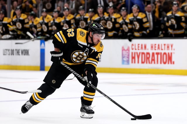 Brad Marchand #63 of the Boston Bruins shoots the puck against the Florida Panthers during the third period in Game Five of the First Round of the 2023 Stanley Cup Playoffs at TD Garden on April 26, 2023 in Boston, Massachusetts.