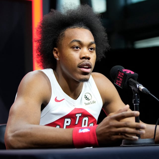 Sep 30, 2024; Toronto, Ontario, Canada; Toronto Raptors forward Scottie Barnes (4) talks to the media during media day at Scotiabank Area. Mandatory Credit: John E. Sokolowski-Imagn Images