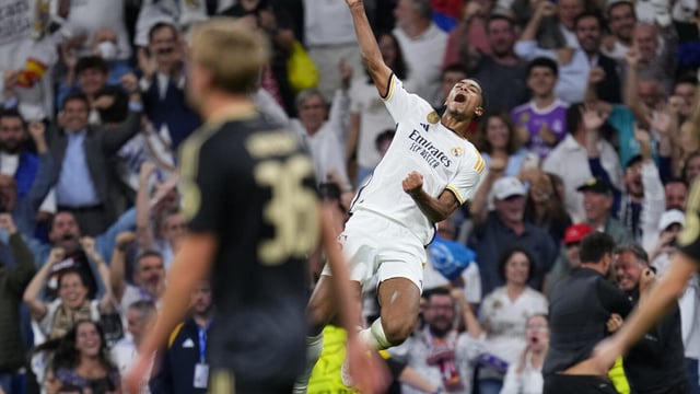 Real Madrid's Jude Bellingham celebrates after scoring his side's first goal during the Champions League group C soccer match between Real Madrid and FC Union Berlin at the Santiago Bernabeu stadium in Madrid, Wednesday, Sept. 20, 2023. (AP Photo/Manu Fernandez)