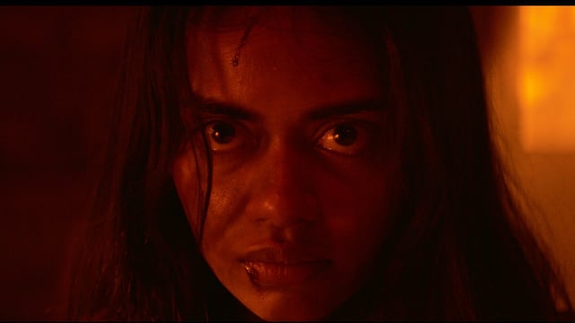 This image released by Neon shows Megan Suri in a scene from "It Lives Inside." (Neon via AP)