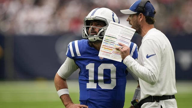Indianapolis Colts quarterback Gardner Minshew II (10) gets a the play from head coach Shane Steichen in the first half of an NFL football game against the Houston Texans in Houston, Sunday, Sept. 17, 2023. (AP Photo/David J. Phillip)