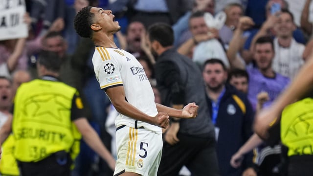 Real Madrid's Jude Bellingham celebrates after scoring his side's first goal during the Champions League group C soccer match between Real Madrid and FC Union Berlin at the Santiago Bernabeu stadium in Madrid, Wednesday, Sept. 20, 2023. (AP Photo/Manu Fernandez)