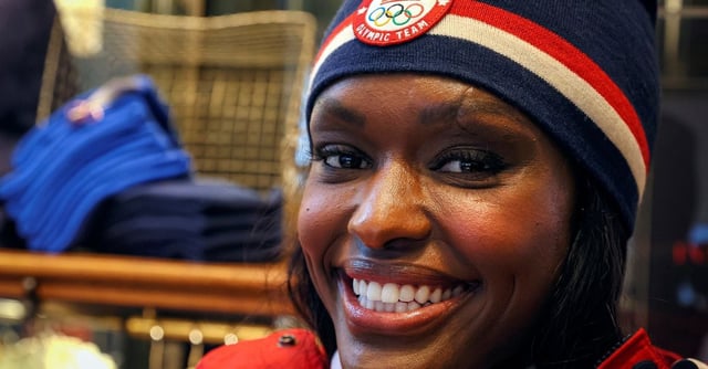U.S. Winter Olympic bobsledder Aja Evans poses for photos wearing Polo Ralph Lauren items designed for U.S. Winter Olympic Team at the company's store in New York City, New York, U.S., January 20, 2022.  REUTERS/Brendan McDermid/File Photo