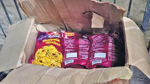 Packets of namkeen filled with cocaine recovered from the Ramesh Nagar godown on Thursday.