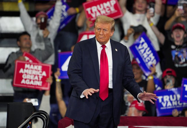Republican presidential nominee and former U.S. President Donald Trump gestures during a campaign rally in Reading, Pennsylvania, U.S. October 9, 2024. REUTERS/Jeenah Moon/File Photo