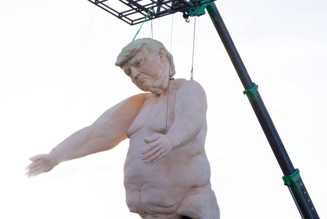 A 43-foot-tall (13 meters) naked statue resembling former US President and Republican presidential candidate Donald Trump is displayed in Las Vegas.