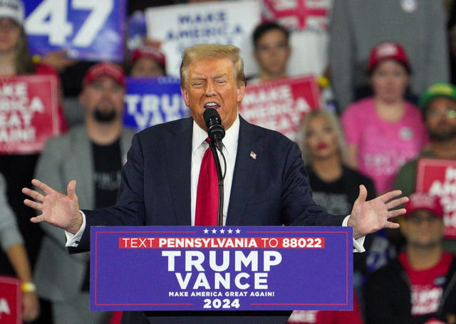 Republican presidential nominee and former U.S. President Donald Trump speaks during a campaign rally in Reading, Pennsylvania, U.S. October 9, 2024. REUTERS/Jeenah Moon/File Photo