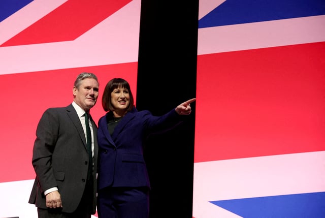 Britain?s Labour Party Leader Keir Starmer stands with Shadow Chancellor of the Exchequer Rachel Reeves following her keynote speech during the Labour Party annual conference in Liverpool, Britain, October 9, 2023. REUTERS/Phil Noble/File Photo