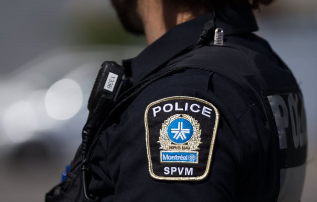 An SPVM police shoulder patch is seen on an officer in Montreal, Thursday, Aug. 29, 2024. THE CANADIAN PRESS/Christinne Muschi