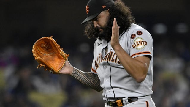 San Francisco Giants starting pitcher Sean Manaea applauds after getting Los Angeles Dodgers' Amed Rosario to fly out to left field during the seventh inning of a baseball game in Los Angeles, Friday, Sept. 22, 2023. (AP Photo/Alex Gallardo)