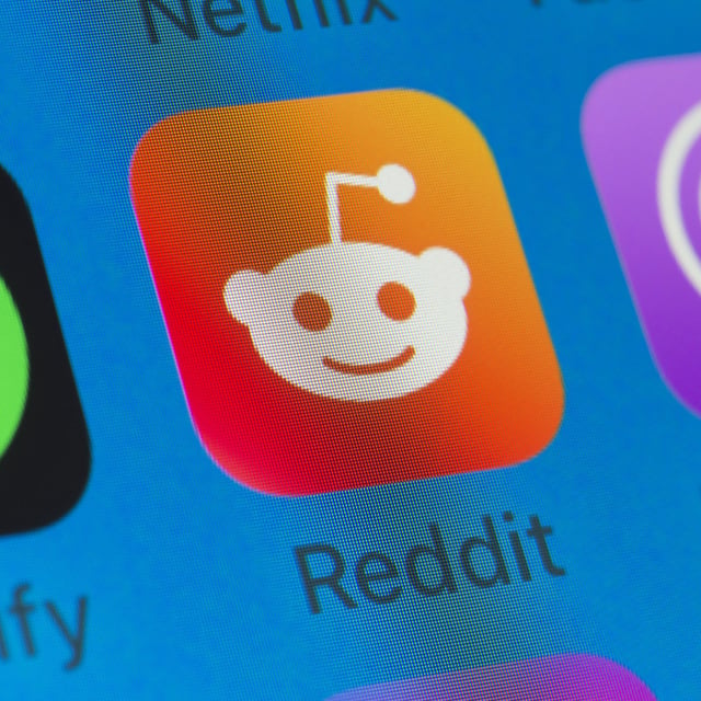 Stock image shows Reddit icon on an iPhone screen. Users reported widespread outages on Monday.