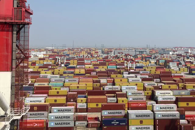 Containers sit at a terminal at the Yangshan deepwater port during an organised media tour, in Shanghai, China October 10, 2024. REUTERS/Casey Hall/File Photo