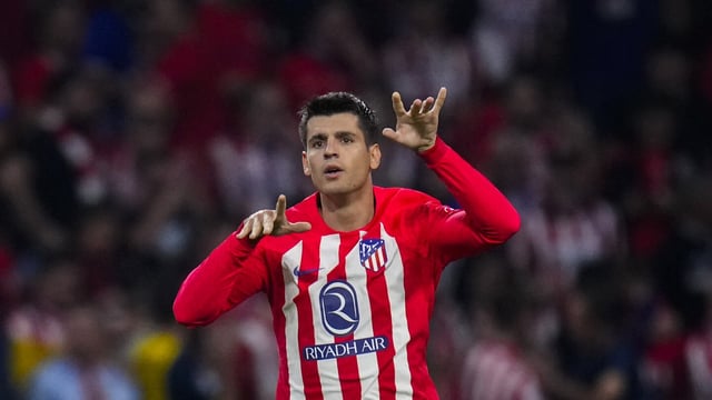 Atletico Madrid's Alvaro Morata celebrates after scoring his side's third goal during the Spanish La Liga soccer match between Atletico Madrid and Real Madrid at Metropolitan stadium in Madrid, Sunday, Sept. 24, 2023. (AP Photo/Manu Fernandez)