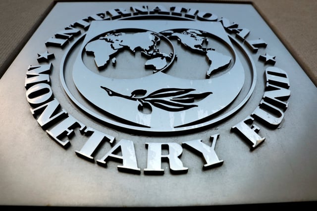 The International Monetary Fund (IMF) logo is seen outside the headquarters building in Washington, U.S., September 4, 2018. REUTERS/Yuri Gripas/File Photo