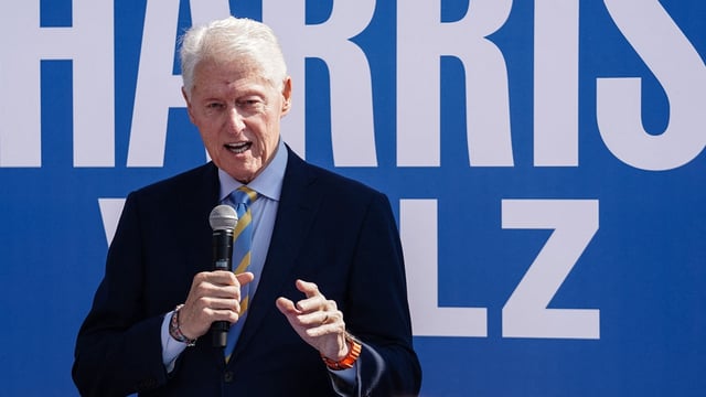 Former US President Bill Clinton speaks on behalf of the Harris/Walz campaign outside a Democratic campaign office on October 14, 2024 in Columbus, Georgia. (Photo by Elijah Nouvelage / AFP)