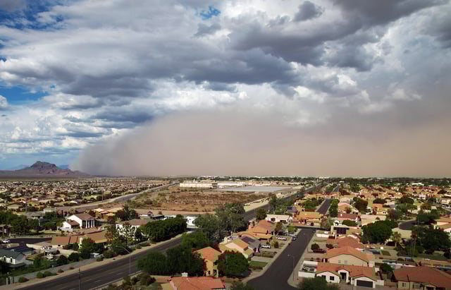 A dust storm moves across the East Valley as a monsoon storm approaches on Aug. 22, 2024.