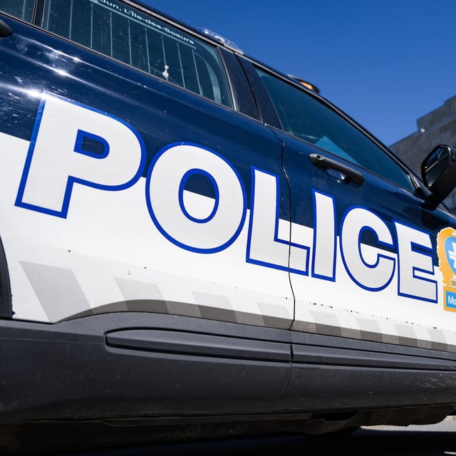 An SPVM police vehicle is seen in Montreal, Thursday, Aug. 29, 2024. Montreal police say they've made an arrest in a fatal stabbing after an altercation on the platform of a downtown metro station late Saturday. THE CANADIAN PRESS/Christinne Muschi