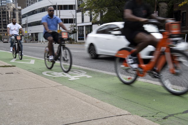 A bright green bicycle lane is seen on Davenport Road in Toronto, Sept. 22, 2024. 