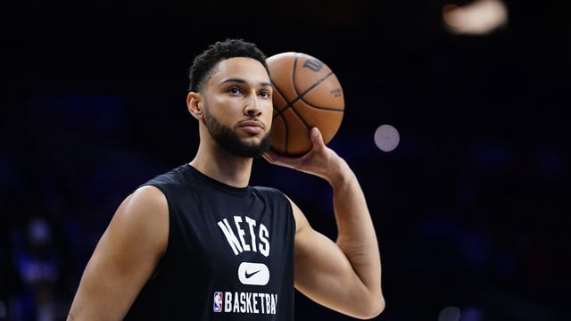 FILE - Brooklyn Nets' Ben Simmons watches practice before an NBA basketball game, Thursday, March 10, 2022, in Philadelphia. Simmons is set to begin training camp next week with no restrictions after two injury-shortened seasons in Brooklyn. Nets coach Jacque Vaughn said Tuesday, Sept. 26, 2023, that the former All-Star has been playing 5-on-5 this summer and will have an expanded role offensively if he can avoid further injuries. (AP Photo/Matt Slocum, File)