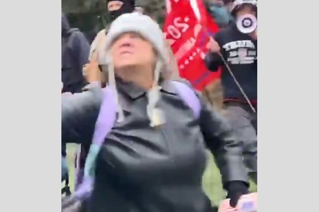 Dana Jean Bell physically assaults MPD Officer S.H. by throwing her elbow into his chest, on Jan. 6, 2020.