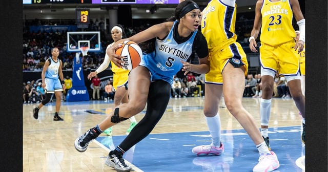 Angel Reese of the Chicago Sky drives into the paint against the Los Angeles Sparks during the first quarter at Wintrust Arena on Sept.6, in Chicago, Illinois. Reese remarked this week that her five-figure WNBA salary doesn't even come close to paying her bills. (Geoff Stellfox / Getty Images)