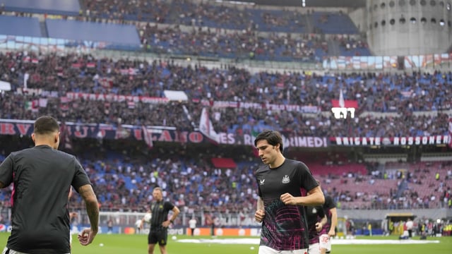 FILE - Newcastle's Sandro Tonali warms up prior to the start of the Champions League group F soccer match between AC Milan and Newcastle at the San Siro stadium in Milan, Italy, Tuesday, Sept. 19, 2023. AC Milan took the first formal step Wednesday, Sept. 27, to moving away from the iconic San Siro, which it shares with Inter Milan, and building a new stadium in the southern part of the city. The Rossoneri announced they had filed a proposal to the council in San Donato to build a 70,000-seater stadium in the city suburb. (AP Photo/Antonio Calanni, File)