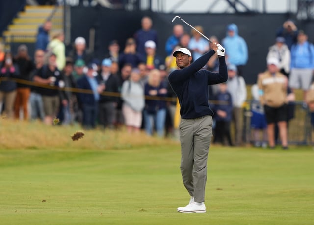 Golf - The 152nd Open Championship - Royal Troon Golf Club, Troon, Scotland, Britain - July 19, 2024 Tiger Woods of the U.S. hits his approach from the 18th fairway during the second round REUTERS/Maja Smiejkowska/File Photo