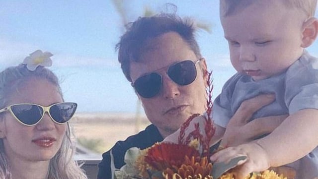 Grimes and Elon with their son.