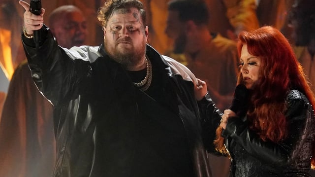 Jelly Roll, left, and Wynonna Judd perform Need a Favor at the 57th Annual CMA Awards on Wednesday, Nov. 8, 2023, at the Bridgestone Arena in Nashville, Tenn. (AP Photo/George Walker IV)