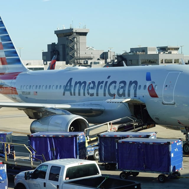 ATLANTA, GEORGIA - OCTOBER 23: An American Airlines plane sits by a gate at the Hartsfield-Jackson Atlanta International Airport on October 23, 2024 in Atlanta, Georgia.  The U.S. Department of Transportation fined American Airlines $50 million for numerous serious violations of the laws protecting airline passengers with disabilities. ( Photo by Joe Raedle/Getty Images)